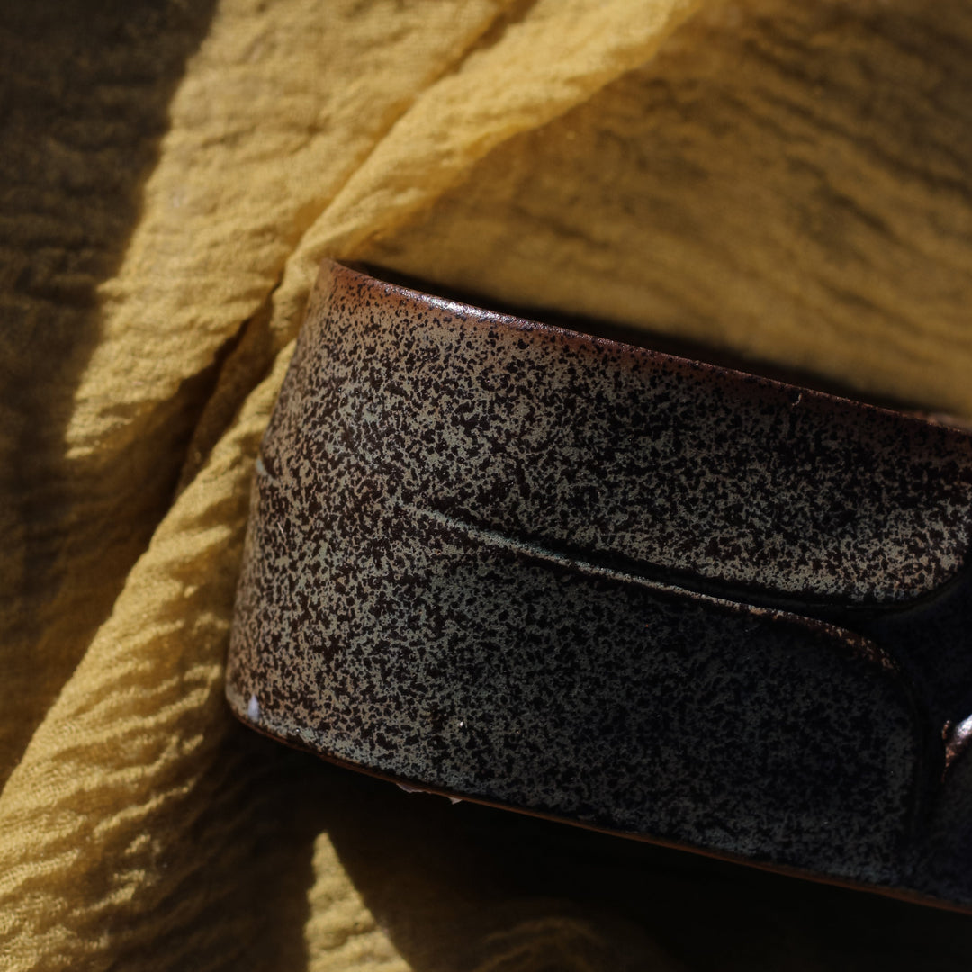Clean-burning soy candle in rustic green ceramic oval vessel, handcrafted by Concrete Poppy Design, Denver
