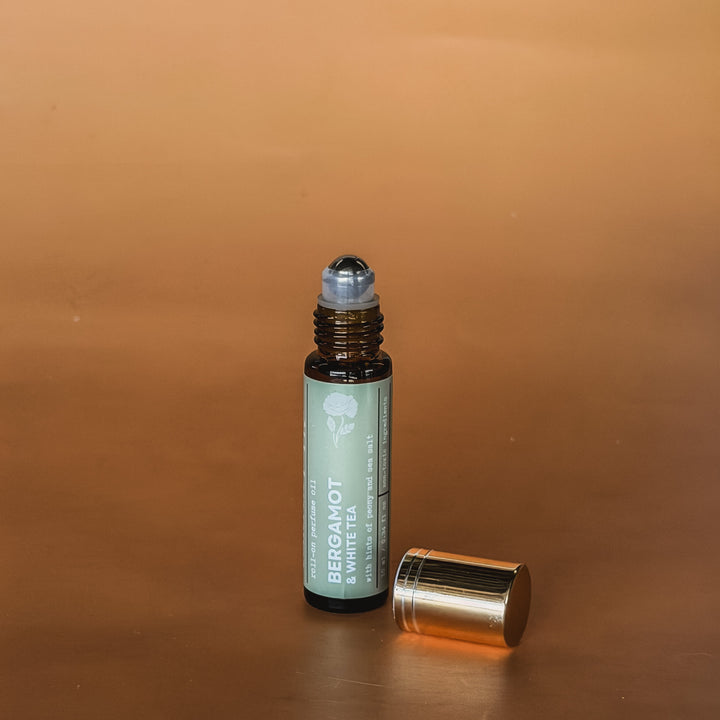 Bergamot white tea roll-on perfume oil by Concrete Poppy Design, handcrafted clean fragrance with peony and sea salt