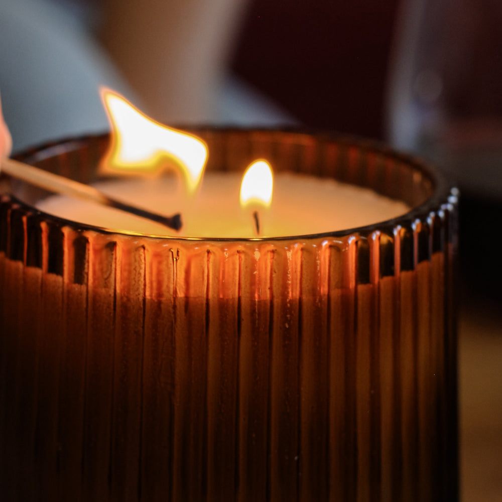 Non-toxic phthalate-free soy candle in ribbed amber glass vessel, clean-burning artisan candle
